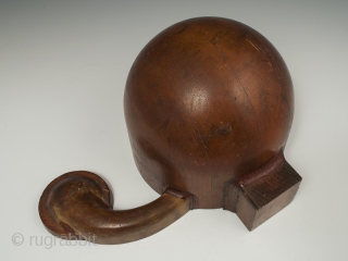 A very curious wood mold, possibly for a hat. The appendage is a mystery, as well as whether there was a second, slightly asymmetrical appendage on the other side at one time.  ...