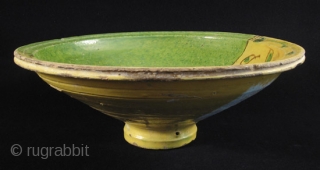 Large bowl, chqâla. Nabeul, Tunisia. These were used at family dinners, often containing the couscous. It is said that the fish motif and the yellow/green colors symbolize water and freedom. 16.5” in  ...