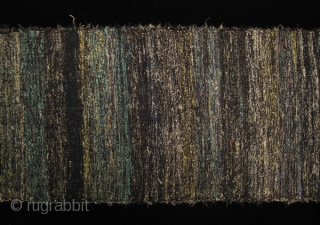 Sakiori obi from Japan. Black, turquoise and cream are spiked with silver in this obi. 7" wide by 129" long. In perfect shape with fringed ends. #9820. Very finely woven strips in  ...