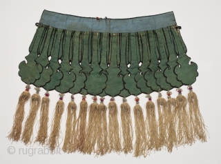 Cloud collar, China. Silk and cotton. 19th - 20th century. 15" (38 cm) from edge of collar to tip of fringe. Neck band is 15.5" (39.4 cm) long. Some areas of fraying  ...