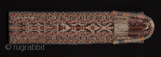 Sash, Cuzco region, Peru. Wool woven on a backstrap loom. Mid 20th century. 68" long by 4" wide.               