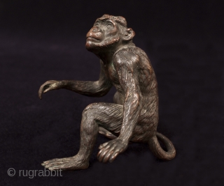 A very expressive small iron monkey.
Origin unknown.
3" (7.5 cm) high.                       