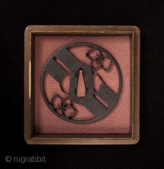 Tsuba sword guard, kyo-sukashi.
Kyoto, Japan.
3.25" (8 cm) diameter.
Momoyama Period (1573-1615).
Original condition.                      