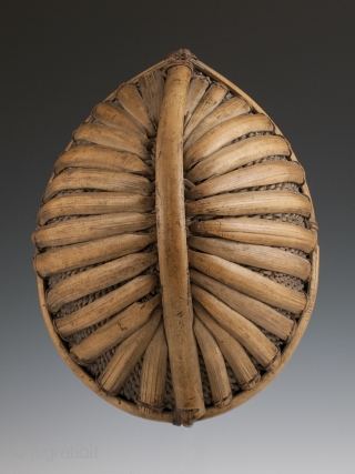 Helmet, Padam (Adi), Arunachal Pradesh, India. Early 20th century, split bamboo cane. These were worn to indicate a man's status and identity.
           