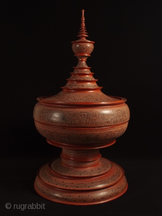 Large offering vessel, hsun ok, Pagan, Burma. Bamboo, lacquer, pigment, 33″ high by 18″ diameter (84 by 45.7 cm), Late 19th or early 20th century.

An imposing offering vessel composed of six pieces,  ...