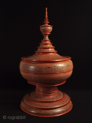 Large offering vessel, hsun ok, Pagan, Burma. Bamboo, lacquer, pigment, 33″ high by 18″ diameter (84 by 45.7 cm), Late 19th or early 20th century.

An imposing offering vessel composed of six pieces,  ...