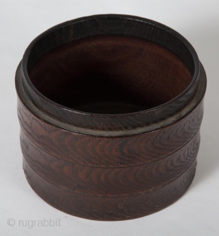 Small box,
Korea.
Zelkova (elm) wood, green paint,
4.25" 10.8 cm) high, 5.5" (14 cm) diameter.
Late 19th to early 20th century.
This unique, beautifully grained box has been carved as if there were three separate tiers  ...
