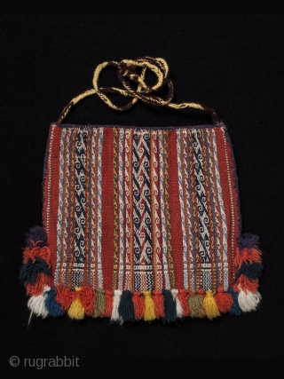Chuspa (coca bag),
Department of Potosi, Bolivar Region, Bolivia.
Wool,
20th century,
7" (17.7 cm) high by 7.5" (19 cm) wide.
Plain weave coca bag, with pattern bands of double-faced weave using complementary warp sets and double  ...