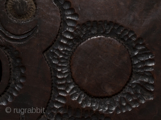 Buddhist temple gong,
Korea.
Zelkova (elm) wood, iron,
10.5" (26.7 cm) high, 15.25" (38.6 cm) wide, 1.5" (3.7 cm) thick.
Late 19th to early 20th century.
There is some mystery surrounding this folk carving, but it appears  ...