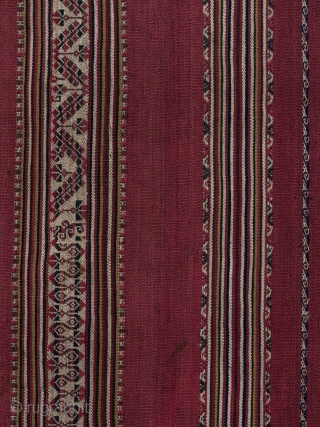 Ponchito (small poncho),
Aymara culture, Bolivar region, Bolivia.
Camelid yarns, natural dyes,
Mid 19th century, 1825-1875,
45" (114 cm) high by 39" (99 cm) wide.
Warp-faced alpaca plain weave with stripes of complementary warp weave. Excellent condition. 