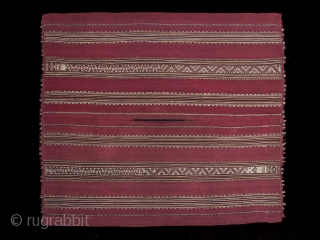 Ponchito (small poncho),
Aymara culture, Bolivar region, Bolivia.
Camelid yarns, natural dyes,
Mid 19th century, 1825-1875,
45" (114 cm) high by 39" (99 cm) wide.
Warp-faced alpaca plain weave with stripes of complementary warp weave. Excellent condition. 