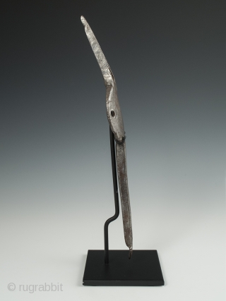 Weaving implement, Morocco, Iron, 12" (30.5 cm) high by 3" (7.6 cm) wide, Mid 20th century or earlier.

An unusual implement used in Moroccan weaving, this two-tined specialty comb has a unique and  ...