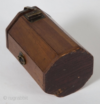 A small, unique octagonal box from Korea. 4.75" (12 cm) high by 3" (7.5 cm) wide. It opens by sliding the latch to the left, which releases the small hook. Brass hardware,  ...