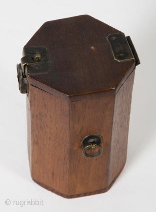 A small, unique octagonal box from Korea. 4.75" (12 cm) high by 3" (7.5 cm) wide. It opens by sliding the latch to the left, which releases the small hook. Brass hardware,  ...