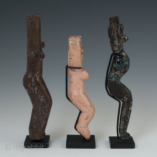 Three slingshots, Guatemala Highlands. Early to mid-20th century. 6.75" (17.1 cm), 5.5" (14 cm) and 6.5" (16.5 cm) high. Ex. private collection, New York. 	

These slingshots are from a dozen that were  ...