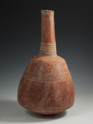 Terracotta Bottle, Djenne area, Mali, 15" (38 cm) high by 24.75" (63 cm) in circumference, late 19th to early-20th century. A handsome terracotta bottle from the Djenne area of Mali with incised  ...