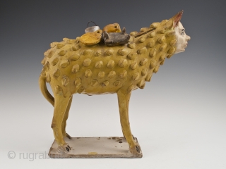 Sheep Nagual Bank,
Tlaquepaque, Jalisco, Mexico.
Earthenware, slip decoration, glaze,
c. 1950s
9.5" 24 cm) high by 10.5" (26.7 cm) wide,
Ex. Fred and Nancy Roscoe collection, California. 	

This sheep nagual figure was likely made by Julián  ...