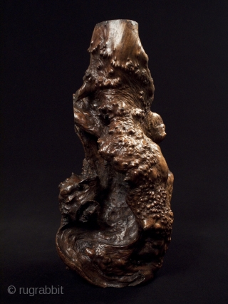Burl candle stand,
Japan.
Burl wood.
17" (43 cm) tall.
Early to mid-20th century.
The hole in the top is 6" deep; this piece has been waxed.           