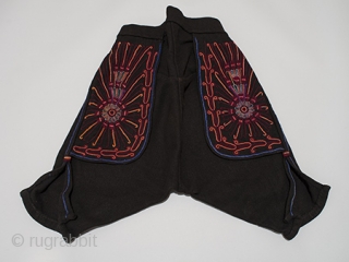 Man's ceremonial (cofradía) outfit, Chichicastenango, Guatemala. Wool, silk thread, Mid-20th century. 25" (63.5 cm) shoulder to hem by 59" (274 cm) across shoulders. It is rare to find a complete cofradia outfit  ...