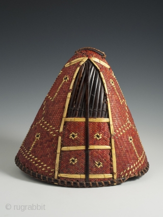 Hat, Naga People, Kalyo-Kengyu eithnic group, Northeastern India. Cane, orchid straw, 8″ (20 cm) high by 8.25″ (21 cm) by  5.5" (14 cm). A red-dyed woven cane conical-shaped warrior's hat has  ...