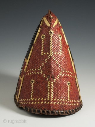 Hat, Naga People, Kalyo-Kengyu eithnic group, Northeastern India. Cane, orchid straw, 8″ (20 cm) high by 8.25″ (21 cm) by  5.5" (14 cm). A red-dyed woven cane conical-shaped warrior's hat has  ...