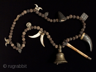 Shaman's mala,
Nepal.
Rudraksha beads, bone, horn, brass, seed pods, string.
41" (104 cm) long.
19th century. 
                   