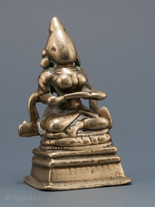 Annapurna,
India.
Lost wax cast bronze/brass.
2.25" (5.7 cm) high.
17-18th century.                         