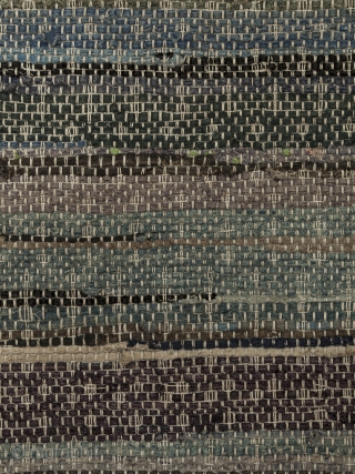 Blanket, Miao ethnic group, Guizhou Province, Southwest China. 71" (22.8 cm) high by 45" (7.6 cm) wide. Early 20th century.
This strip woven blanket is made from recycled fabrics, most of them indigo  ...