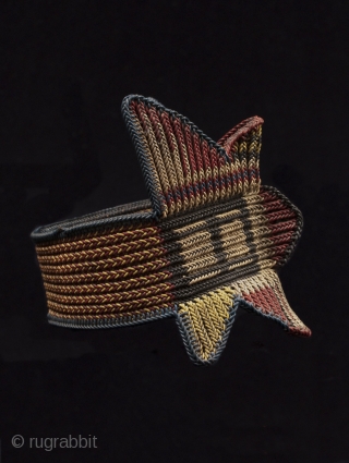 Armband, Konge Village, Morobe Province, Huon Gulf, Papua New Guinea
Traditionally made of plant fiber, this classic pattern is cleverly woven with scavenged electrical wire.
5” high by 10” interior circumference.
Mid-20th century.   