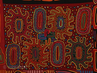 Mola quilt, Kuna People, San Blas Islands, Panama. Cotton, 74 inches (187 cm) high, 96 inches (243 cm) wide. 20th century. This large quilt is composed of thirty-six molas. Molas depicting various  ...