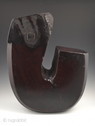 Jizai hearth hook, J type, Japan.
Keyaki wood (elm).
20" (53.3 cm) high, 16" (40.6 cm) wide, 6" (15.2 cm) thick, weight 36 lbs.
Meiji Period.
Jizai in this J form are also called ebisu, so  ...