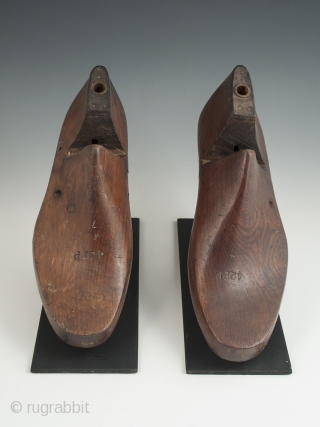 Shoe lasts, USSR. Wood, metal. Early 20th century. 10.75" (27.3 cm) and 11.25" 28.6 cm) long. Not quite a matching pair of old shoe lasts, purchased in Japan but made in the  ...