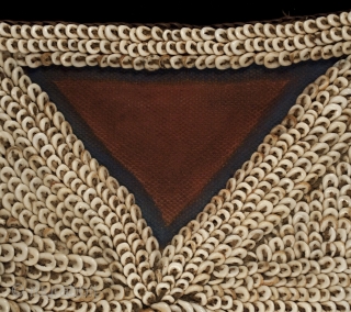 Poli currency. Kabum Valley, Morobe Province, Papua New Guinea. Nassa shells, burlap, fiber, pigments. 11” (28 cm) wide by 13” (33 cm) high. Early to mid-20th century      