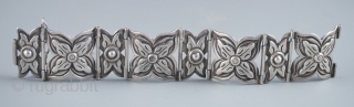 Silver bracelet,
Taxco, Mexico
Silver marked TAXCO 980
68 grams, 7" (17.8 cm) interior circumference and 1 1/8" (2.8 cm) wide
Pre 1940              