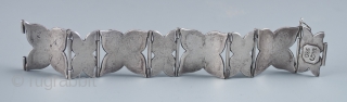 Silver bracelet,
Taxco, Mexico
Silver marked TAXCO 980
68 grams, 7" (17.8 cm) interior circumference and 1 1/8" (2.8 cm) wide
Pre 1940              