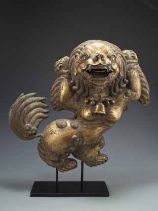 Snow lion plaques,
Tibet.
Copper, pigment, gilding.
Each measures 13" (33 cm) high by 15" (38 cm) wide.
Late 18th to 19th century.              