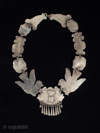 This is a classic repoussé necklace by Ricardo Salas, nephew of Matilde Poulat, an influential jewelry designer who opened her Mexico City workshop in the 1930s.  In beautiful condition. 20.25 inches  ...