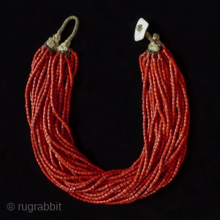 A festive red beaded necklace, Naga people, Nagaland, Northeastern India. Trade beads, shell, string, early to mid-20th century, 20" (58.8 cm) inner circumference.


          