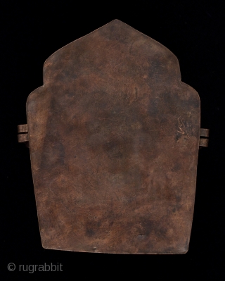 Gau prayer box, Tibet, with a small ceramic figure on the inside of the back panel. It can be seen through the glass window. These were worn while traveling or kept in  ...