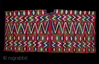 Ceremonial huipil (blouse),
Tecpan village, Guatemala.
Cotton, silk.
1970s or 80s.
51" (129.5 cm) wide by 23.5" (59.7 cm) high.
Ex. private San Francisco collection

The hand-spun cotton threads used for the body of this large huipil are  ...