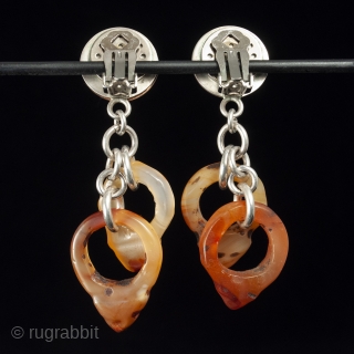 Vintage Agate and Silver Earrings by Jewels. Four rare hair ornaments carved in agate, called tanfouk or talhakimt, drop from a copper and silver disk for a pair of lightweight earrings. These  ...