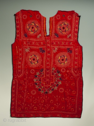 Beautifully embroidered dress from from the Sindh area of Pakistan. Early to mid 20th century.  29" high by 20" wide. Great condition, with all mirrors in place, a few with hairline  ...