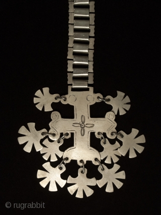 Trapelacucha pectoral, Mapuche, Chile. Nickel silver. 11" (28 cm) high by 4" (10 cm). Early to mid-20th century.               
