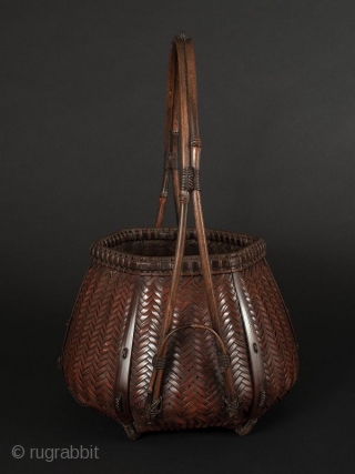 Japanese Antique Bamboo Basket Signed


Japanese antique bamboo basket, with beautiful handle attached at the lower sides and bound with special decorative stylized knots. Hexagonal body of woven herringbone pattern. Feet at bottom  ...