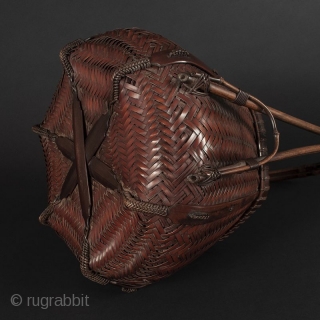 Japanese Antique Bamboo Basket Signed


Japanese antique bamboo basket, with beautiful handle attached at the lower sides and bound with special decorative stylized knots. Hexagonal body of woven herringbone pattern. Feet at bottom  ...