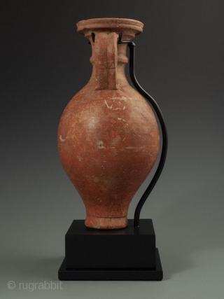 Antique Roman Vase with Stand

Red clay Roman pottery vessel with handle, flanged lip over curved body, worn white design, most likely a wine ewer, display stand.

Provenance Handley Collection 

Date 300 AD 

Size  ...