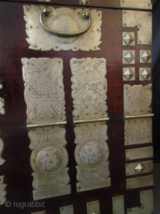 Antique Korean Ginko wood Bandaji (blanket chest)


Beautiful Northern Korean bandaji (blanket storage chest) with highly ornate white brass fittings incised with birds and flowers and auspicious symbols. The white brass plated mounts  ...