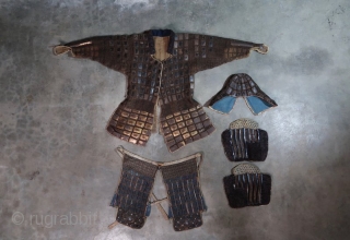 Antique Japanese Tatami Gurata Gusoku

The tatami armor was used by foot soldiers, archers, and spearmen. Its a lightweight armor which allowed the warriors to be more swift and fluid with their movements.  ...