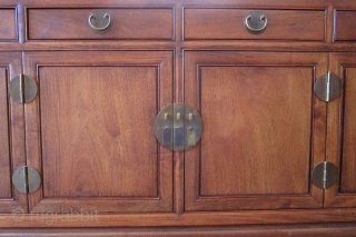 Mid Century Chinese Buffet Console Chest or Cabinet Hauli Wood

A mid century Chinese Buffet or Console Chest or cabinet made entirely of Chinese Hauli wood. Two double hinged doors open to a  ...