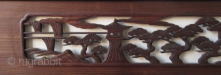 Antique Japanese Ranma (transom)
Antique Japanese wood ranma (transom) with a black lacquer frame. The center panel carved with a Shinto gate (torii) and temple lantern in a forest of pine trees. 

Dimensions:  ...